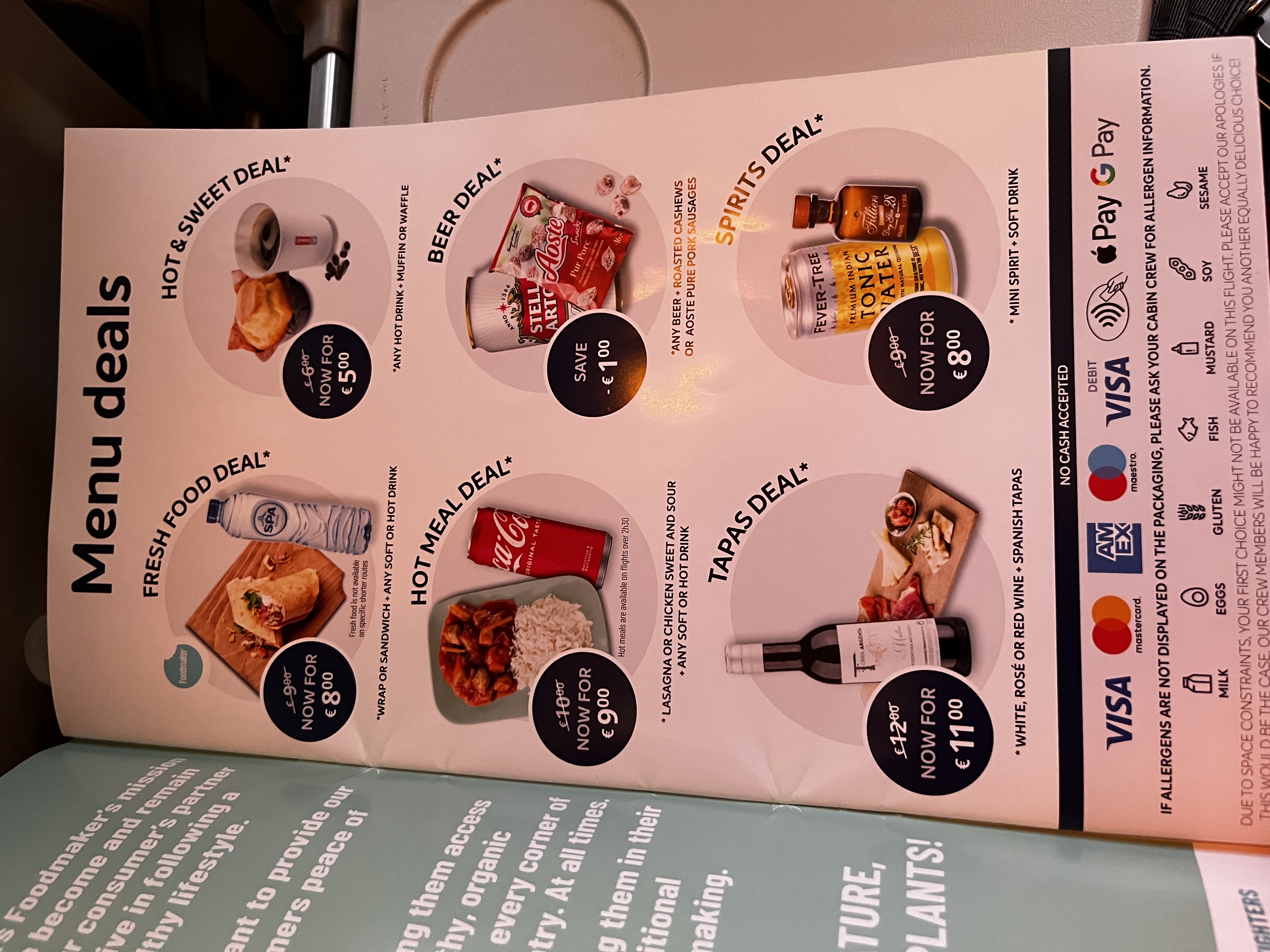 Bordmenü mit sechs Deal-Angeboten: Fresh Food, Hot & Sweet, Hot Meal, Beer, Tapas und Spirits Deal mit Preisen.