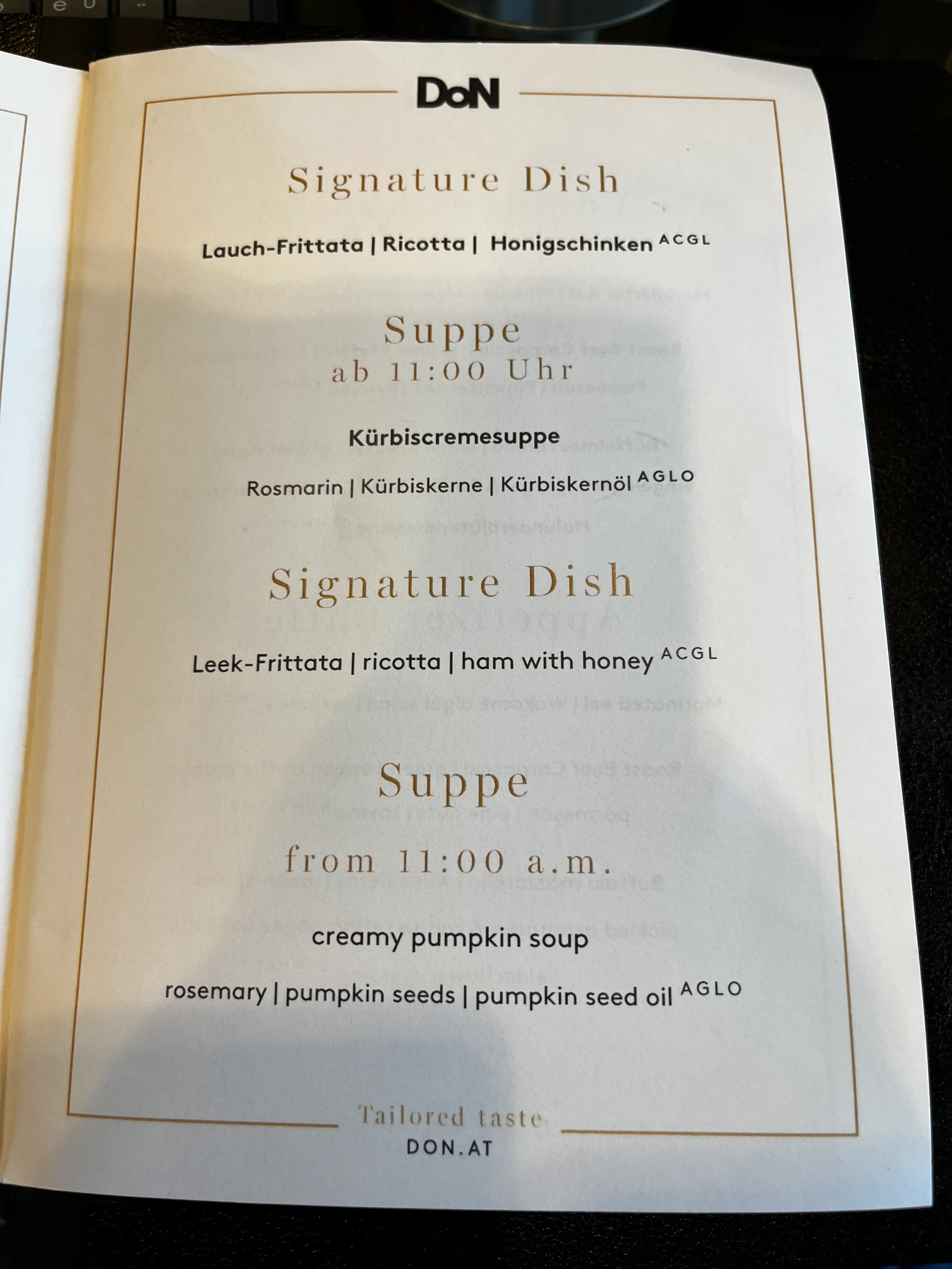 Speisekarte mit Signature Dish und Suppe