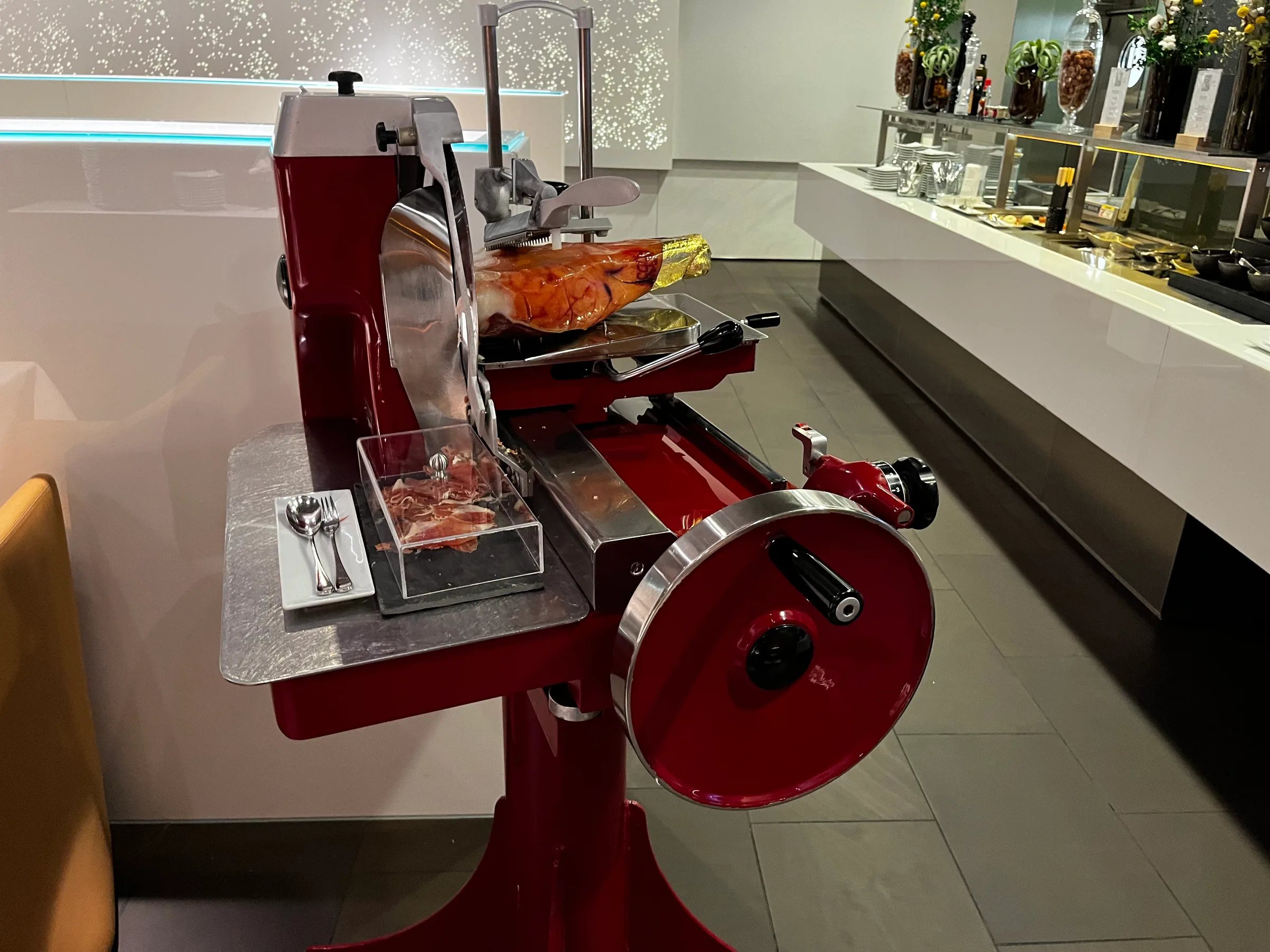 Ham-slicing machine in First Class lounge