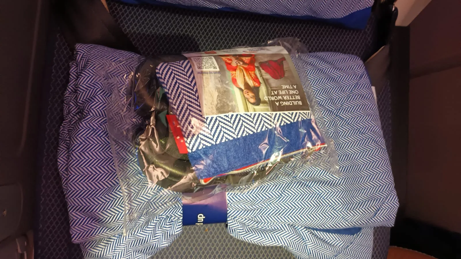 Premium Economy Sitzkissen und -tasche auf gepolstertem Sitz
